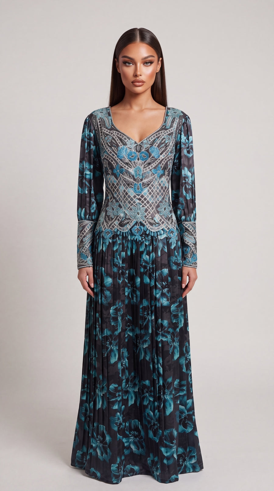 Sadil charcoal and teal floral print long sleeve maxi dress with V-neckline, pleated skirt, and intricate embroidery.